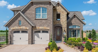 exterior of lions gate home model at Woodcreek