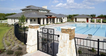 exterior of woodcreek clubhouse and pool