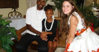 Woodcreek Community event photo of dad daughter and woman dressed up in western outfit