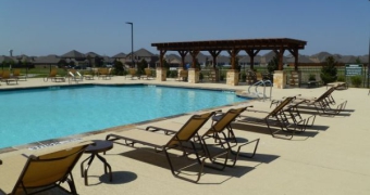 Woodcreek Lakeside Amenity pool and lounge chairs