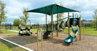 playgound at woodcreek with slides and jungle gym