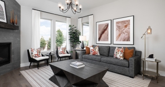 living room by TriPointe Homes at Woodcreek